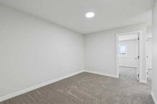 309 Cobblestone Gate Sw, Airdrie, AB - Indoor Photo Showing Other Room