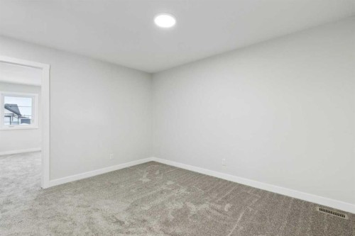 309 Cobblestone Gate Sw, Airdrie, AB - Indoor Photo Showing Other Room