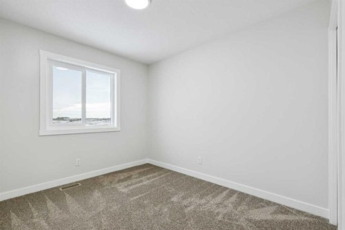 309 Cobblestone Gate Sw, Airdrie, AB - Indoor Photo Showing Other Room