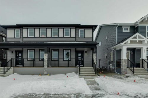 309 Cobblestone Gate Sw, Airdrie, AB - Outdoor With Deck Patio Veranda With Facade
