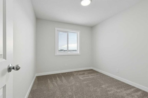 309 Cobblestone Gate Sw, Airdrie, AB - Indoor Photo Showing Other Room