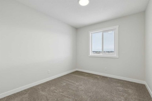 309 Cobblestone Gate Sw, Airdrie, AB - Indoor Photo Showing Other Room