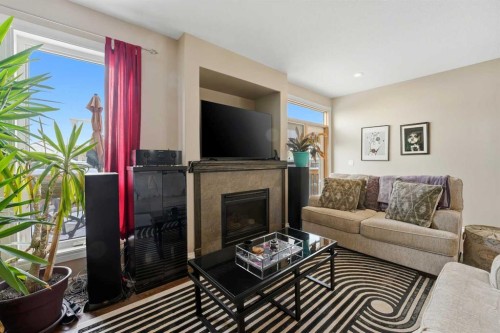 35 Windermere Close, Red Deer, AB - Indoor Photo Showing Living Room With Fireplace