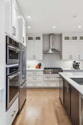 38 Yarrow Gate, Rural Rocky View County, AB - Indoor Photo Showing Kitchen With Upgraded Kitchen