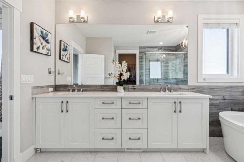 38 Yarrow Gate, Rural Rocky View County, AB - Indoor Photo Showing Bathroom