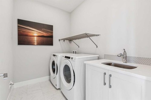 38 Yarrow Gate, Rural Rocky View County, AB - Indoor Photo Showing Laundry Room
