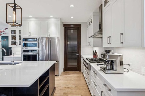 38 Yarrow Gate, Rural Rocky View County, AB - Indoor Photo Showing Kitchen With Upgraded Kitchen