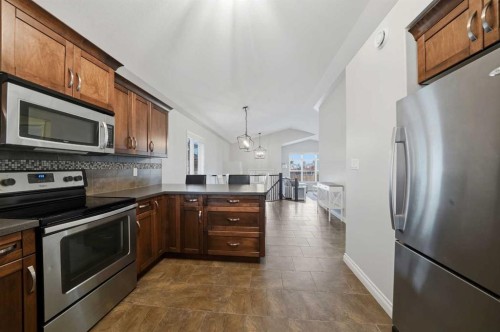 69 Bowman Circle, Sylvan Lake, AB - Indoor Photo Showing Kitchen With Stainless Steel Kitchen