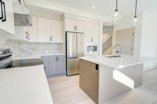 6 Ian Way, Sylvan Lake, AB - Indoor Photo Showing Kitchen With Stainless Steel Kitchen With Upgraded Kitchen