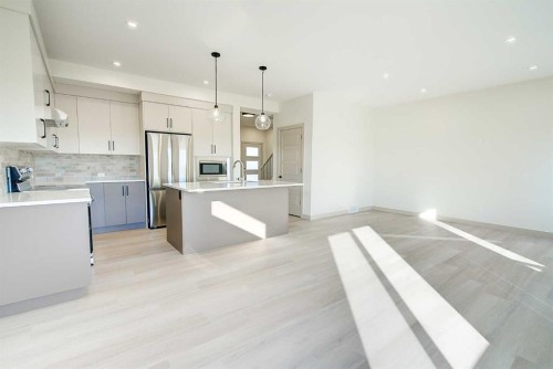 6 Ian Way, Sylvan Lake, AB - Indoor Photo Showing Kitchen With Stainless Steel Kitchen With Upgraded Kitchen