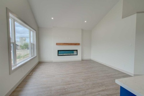 18 Trout Avenue, Red Deer, AB - Indoor With Fireplace