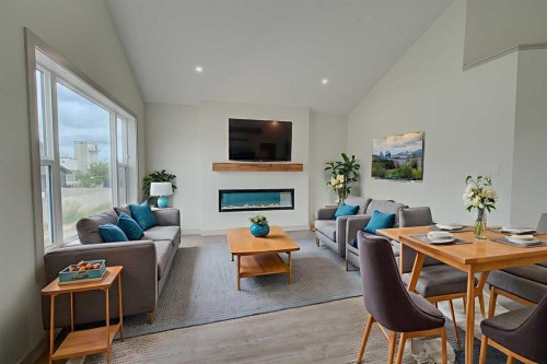 18 Trout Avenue, Red Deer, AB - Indoor Photo Showing Living Room With Fireplace