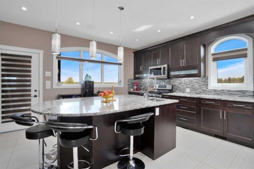 242-27240 Township Road 392, Rural Red Deer County, AB - Indoor Photo Showing Kitchen With Upgraded Kitchen