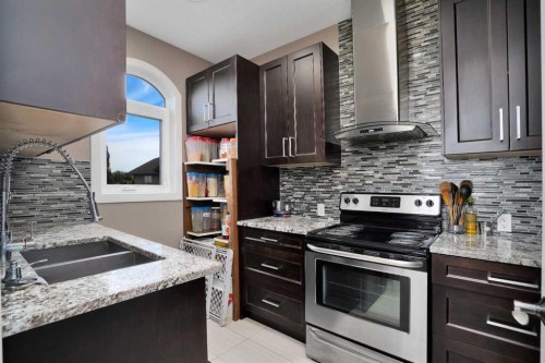 242-27240 Township Road 392, Rural Red Deer County, AB - Indoor Photo Showing Kitchen With Double Sink With Upgraded Kitchen