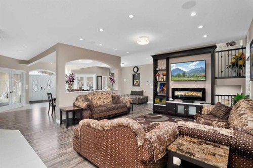 242-27240 Township Road 392, Rural Red Deer County, AB - Indoor Photo Showing Living Room With Fireplace