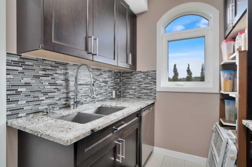 242-27240 Township Road 392, Rural Red Deer County, AB - Indoor Photo Showing Kitchen With Double Sink With Upgraded Kitchen