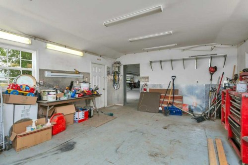 36009 Highway 2A South, Rural Red Deer County, AB - Indoor Photo Showing Garage
