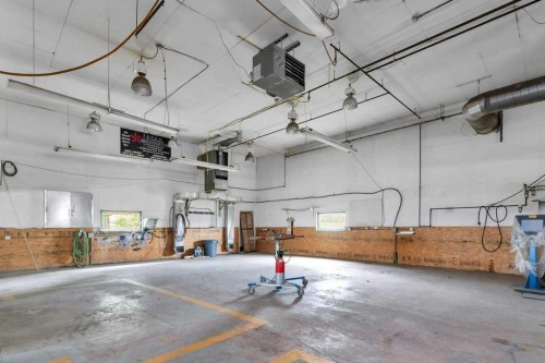 36009 Highway 2A South, Rural Red Deer County, AB - Indoor Photo Showing Garage