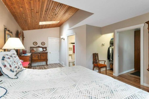 36009 Highway 2A South, Rural Red Deer County, AB - Indoor Photo Showing Bedroom