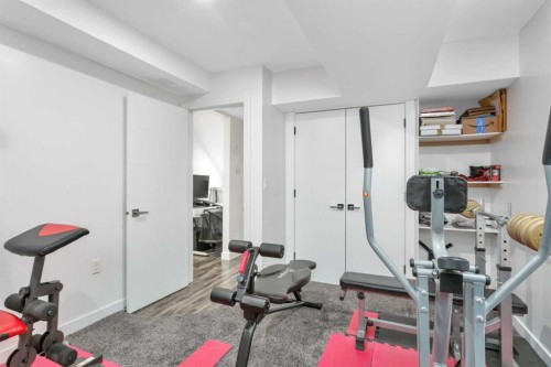 10 Mitchell Crescent, Blackfalds, AB - Indoor Photo Showing Gym Room