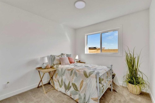 24 Violet Point, Sylvan Lake, AB - Indoor Photo Showing Bedroom
