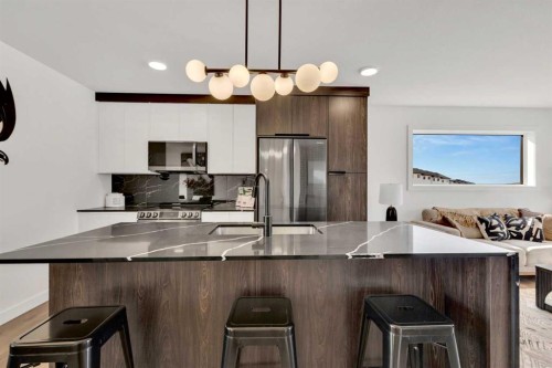 24 Violet Point, Sylvan Lake, AB - Indoor Photo Showing Kitchen With Upgraded Kitchen