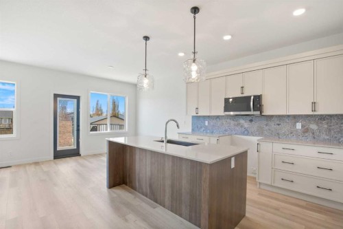 32 Sunrise Crescent North, Three Hills, AB - Indoor Photo Showing Kitchen With Upgraded Kitchen