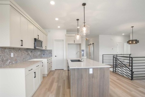 32 Sunrise Crescent North, Three Hills, AB - Indoor Photo Showing Kitchen With Upgraded Kitchen