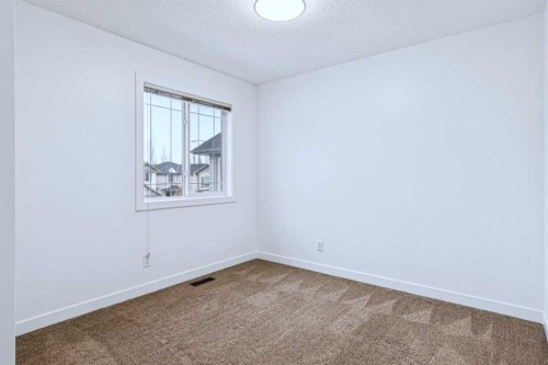 174 Brightonstone Landing Se, Calgary, AB - Indoor Photo Showing Other Room