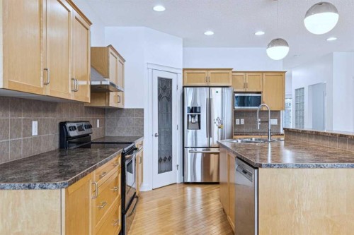 174 Brightonstone Landing Se, Calgary, AB - Indoor Photo Showing Kitchen With Stainless Steel Kitchen With Double Sink