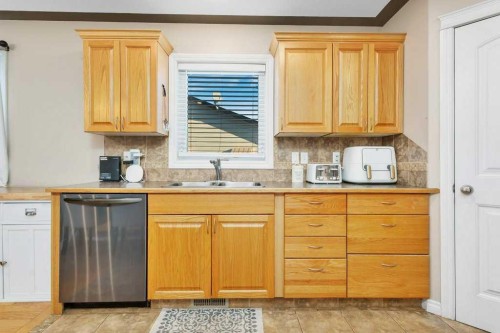 4912 46A Street, Clive, AB - Indoor Photo Showing Kitchen With Double Sink