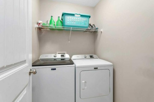 4912 46A Street, Clive, AB - Indoor Photo Showing Laundry Room