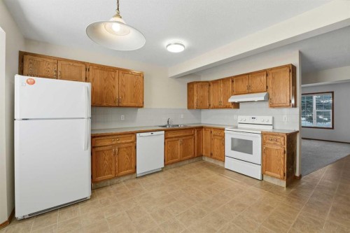 2 Davis Close, Red Deer, AB - Indoor Photo Showing Kitchen With Double Sink