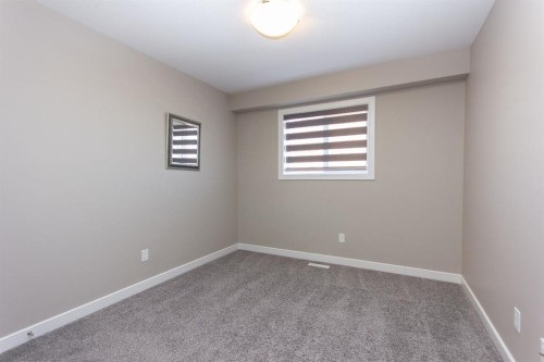 202-148 Vanier Drive, Red Deer, AB - Indoor Photo Showing Other Room