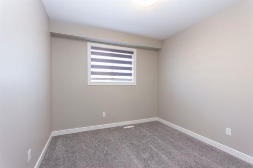 202-148 Vanier Drive, Red Deer, AB - Indoor Photo Showing Other Room