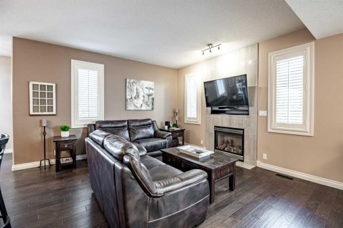 24 Argent Close, Red Deer, AB - Indoor Photo Showing Living Room With Fireplace