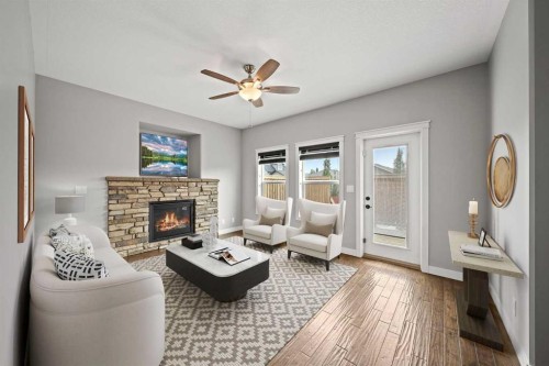 85 Turner Crescent, Red Deer, AB - Indoor Photo Showing Living Room With Fireplace
