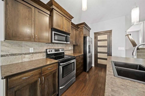 85 Turner Crescent, Red Deer, AB - Indoor Photo Showing Kitchen With Double Sink