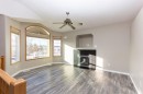 313 Westridge Drive, Blackfalds, AB  - Indoor Photo Showing Living Room With Fireplace 