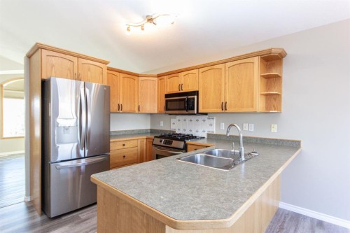313 Westridge Drive, Blackfalds, AB - Indoor Photo Showing Kitchen With Stainless Steel Kitchen With Double Sink