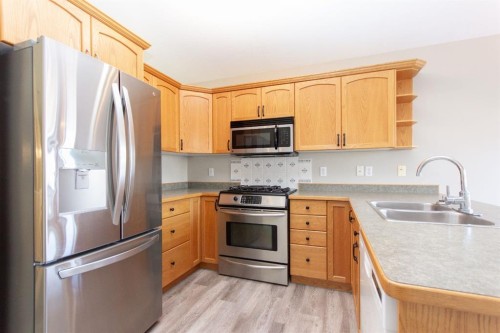313 Westridge Drive, Blackfalds, AB - Indoor Photo Showing Kitchen With Stainless Steel Kitchen With Double Sink