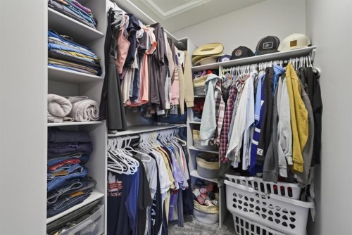 30 Fulmar Close, Sylvan Lake, AB - Indoor With Storage