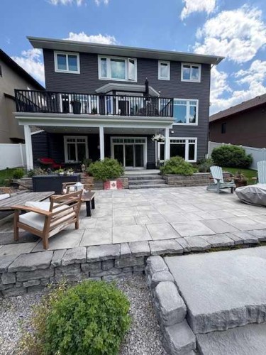 42 Grove Close, Red Deer, AB - Outdoor With Deck Patio Veranda With Facade