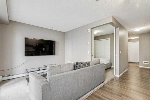 3312-4641 128 Avenue Ne, Calgary, AB - Indoor Photo Showing Living Room
