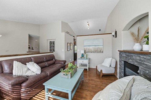 8 Van Dorp Street, Red Deer, AB - Indoor Photo Showing Living Room With Fireplace