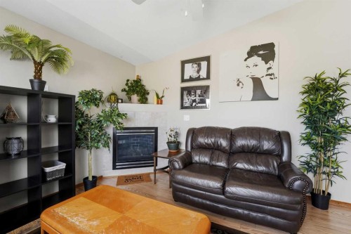 1 Duval Crescent, Red Deer, AB - Indoor Photo Showing Living Room With Fireplace