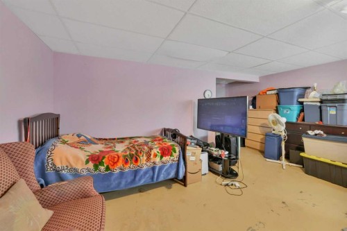 52 Roland, Red Deer, AB - Indoor Photo Showing Bedroom