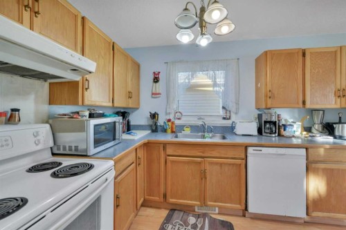 52 Roland, Red Deer, AB - Indoor Photo Showing Kitchen With Double Sink