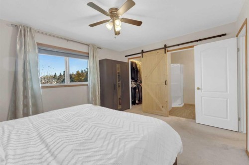 16 Parson Drive, Sylvan Lake, AB - Indoor Photo Showing Bedroom