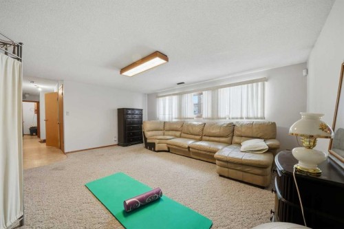 32 Huget Crescent, Red Deer, AB - Indoor Photo Showing Living Room